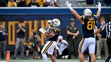 Jahiem White celebrates in the endzone during the win against Kansas last month.