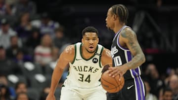 Milwaukee Bucks forward Giannis Antetokounmpo defends against Sacramento Kings forward DeMar DeRozan during the first quarter at Golden 1 Center on March 22.