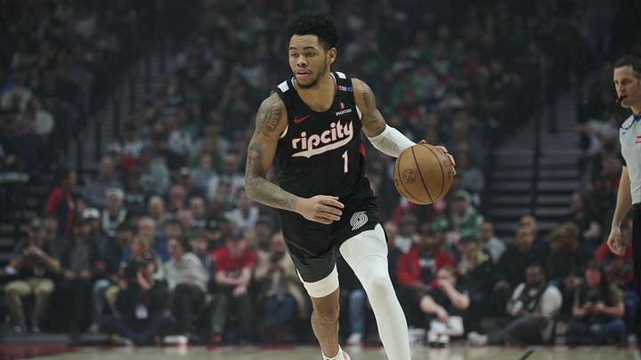 Mar 23, 2025; Portland, Oregon, USA; Portland Trail Blazers guard Anfernee Simons (1) dribbles the ball during the first half against the Boston Celtics at Moda Center. Mandatory Credit: Troy Wayrynen-Imagn Images