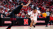 Jan 22, 2025; Lincoln, Nebraska, USA; Nebraska Cornhuskers guard Ahron Ulis (2) drives against Southern California Trojans forward Matt Knowling (3) during the first half at Pinnacle Bank Arena.