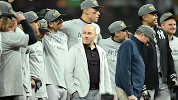 New York Yankees general manager Brian Cashman celebrates AL Championship Series victory over Cleveland Guardians.