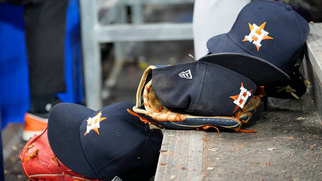 Jun 24, 2026; Toronto, Ontario, CAN; Houston Astros ball caps and gloves in the dugout during a game against the Toronto Blue Jays at Rogers Centre. Mandatory Credit: John E. Sokolowski-Imagn Images