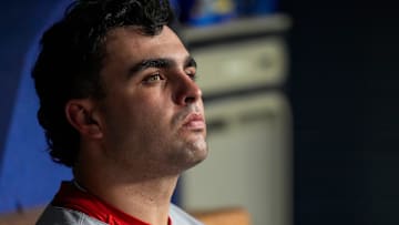 Cincinnati Reds third baseman Sal Stewart (43) sits in the dugout