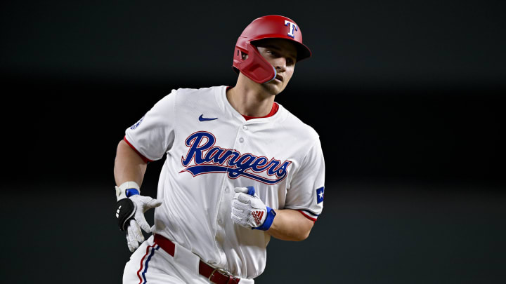 Texas Rangers shortstop Corey Seager (5) rounds the bases after he hits a home run against the Houston Astros during the eighth inning at Globe Life Field on Aug 5.