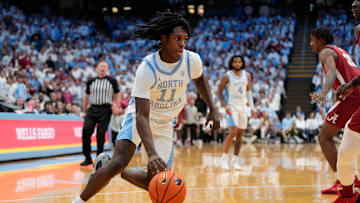 Dec 4, 2024; Chapel Hill, North Carolina, USA;  North Carolina Tar Heels guard Ian Jackson (11) with the ball in the second half at Dean E. Smith Center. Mandatory Credit: Bob Donnan-Imagn Images