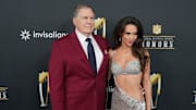 North Carolina Tar Heels head coach Bill Belichick and Jordon Hudson on the red carpet before Super Bowl LIX NFL Honors 