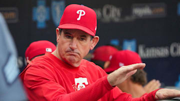 Aug 23, 2024; Kansas City, Missouri, USA; Philadelphia Phillies manager Rob Thomson (59) in the dugout against the Kansas City Royals prior to a game at Kauffman Stadium. Mandatory Credit: Denny Medley-Imagn Images