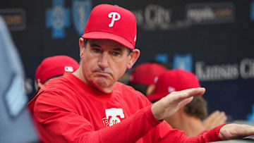 Aug 23, 2024; Kansas City, Missouri, USA; Philadelphia Phillies manager Rob Thomson (59) in the dugout against the Kansas City Royals prior to a game at Kauffman Stadium. Mandatory Credit: Denny Medley-Imagn Images