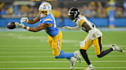 Nov 9, 2025; Inglewood, California, USA; Los Angeles Chargers tight end Oronde Gadsden II (86) is unable to catch the ball defended by Pittsburgh Steelers cornerback Joey Porter Jr. (24) during the first quarter of the game at SoFi Stadium. Mandatory Credit: Jayne Kamin-Oncea-Imagn Images