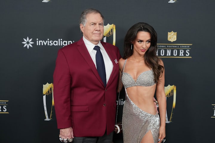 Bill Belichick and Jordon Hudson on the red carpet before Super Bowl LIX NFL Honors.