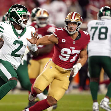 Sep 9, 2024; Santa Clara, California, USA; New York Jets quarterback Tyrod Taylor (2) scrambles against San Francisco 49ers defensive end Nick Bosa (97) during the fourth quarter at Levi's Stadium.