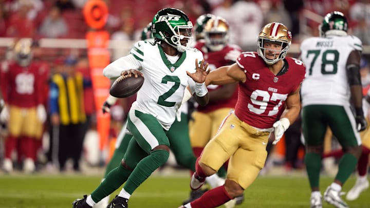 Sep 9, 2024; Santa Clara, California, USA; New York Jets quarterback Tyrod Taylor (2) scrambles against San Francisco 49ers defensive end Nick Bosa (97) during the fourth quarter at Levi's Stadium.