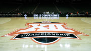 Mar 12, 2024; Kansas City, MO, USA; Big 12 Championship logo at center court prior to the game between the UCF Knights and the Oklahoma State Cowboys at T-Mobile Center. Mandatory Credit: William Purnell-USA TODAY Sports