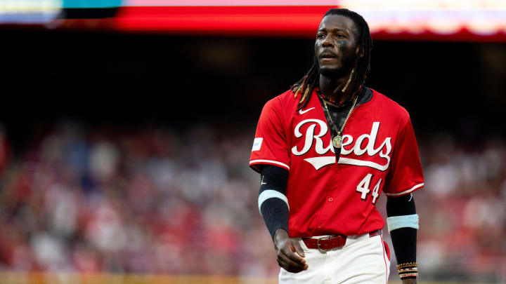 Cincinnati Reds shortstop Elly De La Cruz (44) walks back to grab his gloves after being stranded on second in the fourth inning of the MLB game between the Cincinnati Reds and Kansas City Royals at Great American Ball Park in Cincinnati on Saturday, Aug. 17, 2024.