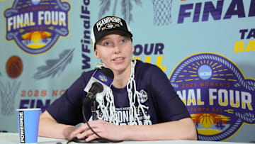 Apr 6, 2025; Tampa, FL, USA; Connecticut Huskies guard Paige Bueckers (5) speaks to the media after the national championship of the women's 2025 NCAA tournament against the South Carolina Gamecocks at Amalie Arena. Mandatory Credit: Kirby Lee-Imagn Images