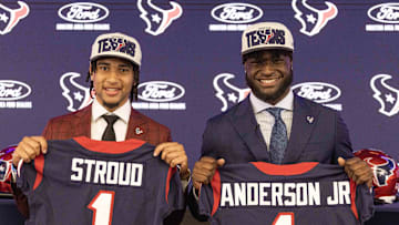 Apr 28, 2023; Houston, TX, USA; From left to right, Houston Texans quarterback CJ Stroud (left), second overall pick in the 2023 NFL Draft, and Texans linebacker Will Anderson Jr., third overall pick in the 2023 NFL Draft, pose for a photo at a press conference at NRG Stadium. Mandatory Credit: Thomas Shea-Imagn Images
