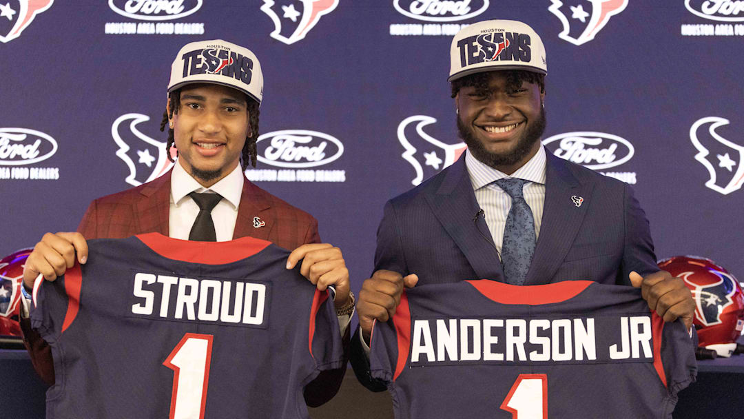 Apr 28, 2023; Houston, TX, USA; From left to right, Houston Texans quarterback CJ Stroud (left), second overall pick in the 2023 NFL Draft, and Texans linebacker Will Anderson Jr., third overall pick in the 2023 NFL Draft, pose for a photo at a press conference at NRG Stadium. Mandatory Credit: Thomas Shea-Imagn Images