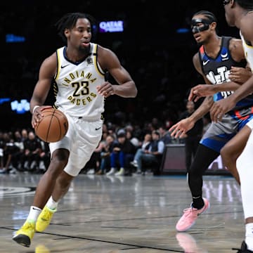 Apr 3, 2024; Brooklyn, New York, USA; Indiana Pacers forward Aaron Nesmith (23) drives to the basket.