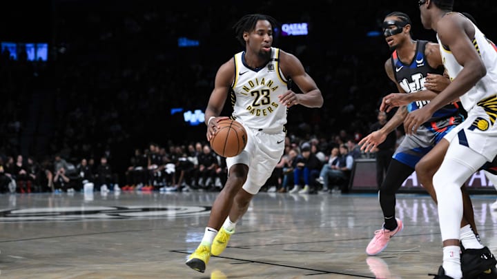 Apr 3, 2024; Brooklyn, New York, USA; Indiana Pacers forward Aaron Nesmith (23) drives to the basket.