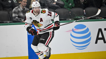 Blackhawks C Jason Dickson signed a two-year, $8.5 million extension on Tuesday. 