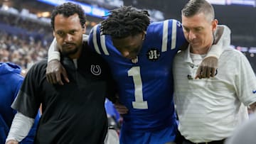 Indianapolis Colts cornerback Sauce Gardner (1) is helped off the field following an injury Sunday, Nov. 30, 2025, during a game against the Houston Texans at Lucas Oil Stadium in Indianapolis.