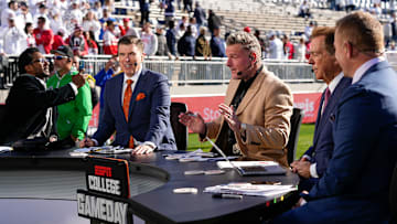 The ESPN College Gameday crew, from left, Desmond Howard, Rece Davis, Pat McAfee, Nick Saban and Kirk Herbstreit, prepares to broadcast from the field prior to the NCAA football game between the Penn State Nittany Lions and the Ohio State Buckeyes at Beaver Stadium