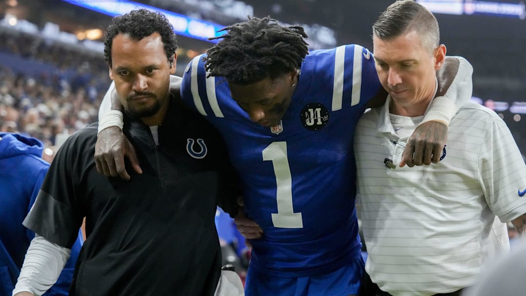 Indianapolis Colts cornerback Sauce Gardner (1) is helped off the field following an injury Sunday, Nov. 30, 2025, during a game against the Houston Texans at Lucas Oil Stadium in Indianapolis.