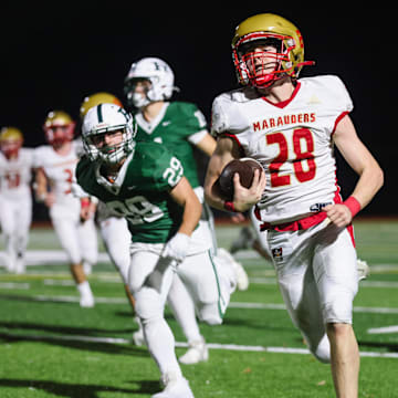 Mount Olive RB Adam DeCristofaro finds daylight on his way to a long TD run.