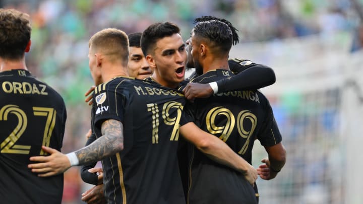 Jul 20, 2024; Seattle, Washington, USA; LAFC forward Denis Bouanga (99) celebrates with teammates after scoring a goal against Seattle Sounders FC in the first half at Lumen Field. Mandatory Credit: Steven Bisig-USA TODAY Sports