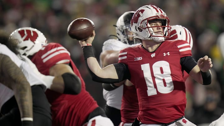 Wisconsin quarterback Braedyn Locke (18) throws during the first quarter of their game against Oregon Saturday, November 16, 2024 at Camp Randall Stadium in Madison, Wisconsin.