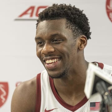 Feb 26, 2025; Stanford, California, USA;  Stanford Cardinal forward Maxime Raynaud (42) reacts during a press conference after defeating the Boston College Eagles at Maples Pavilion. Mandatory Credit: Stan Szeto-Imagn Images