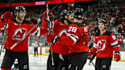 Oct 19, 2024; Newark, New Jersey, USA; New Jersey Devils center Nico Hischier (13) celebrates with teammates after scoring a goal against the Washington Capitals during the second period at Prudential Center. Mandatory Credit: John Jones-Imagn Images