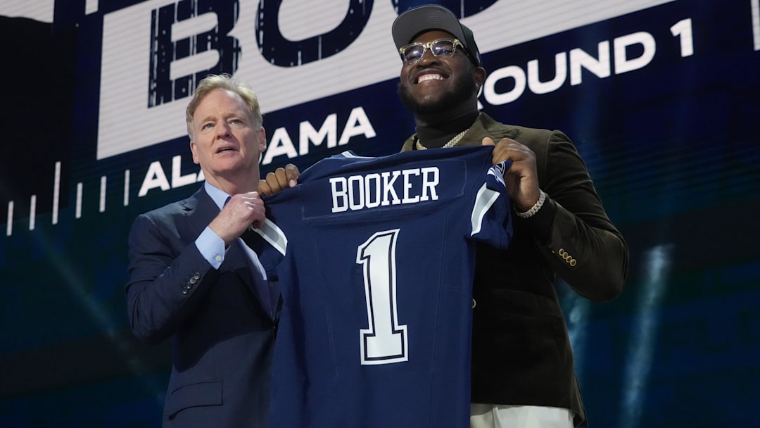 Apr 24, 2025; Green Bay, WI, USA; NFL commissioner Roger Goodell with Alabama Crimson Tide offensive lineman Tyler Booker after he is selected by the Dallas Cowboys.