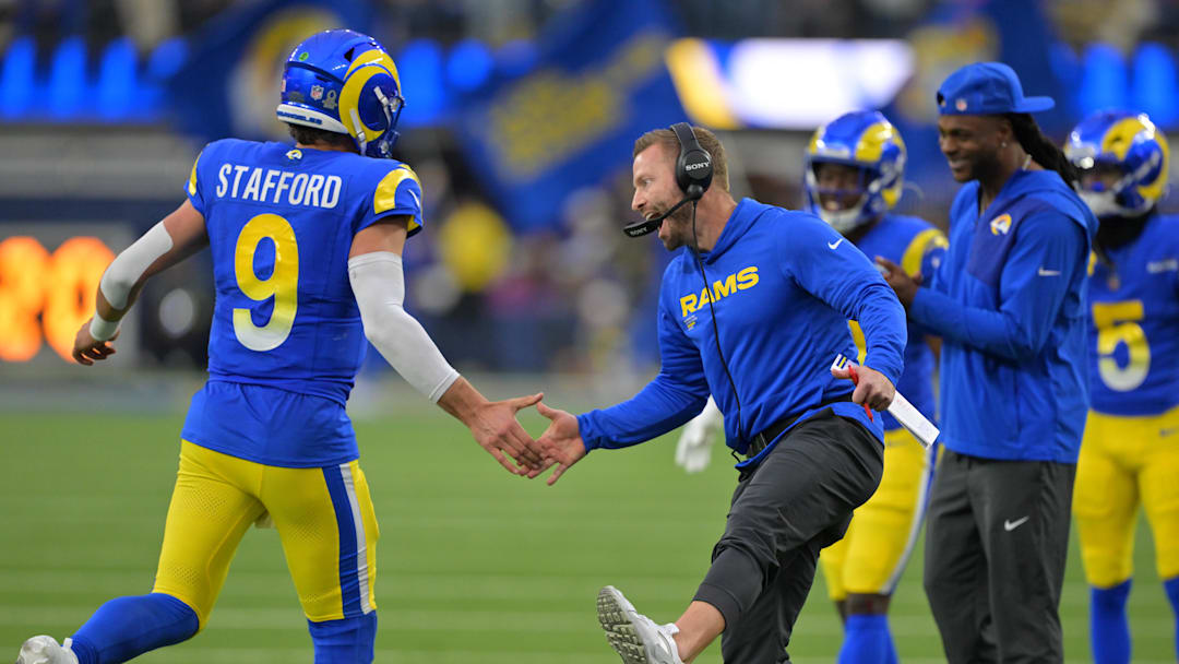 Jan 4, 2026; Inglewood, California, USA;  Los Angeles Rams head coach Sean McVay reacts with quarterback Matthew Stafford (9) after a touchdown against the Arizona Cardinals during the second half at SoFi Stadium. Mandatory Credit: Jayne Kamin-Oncea-Imagn Images