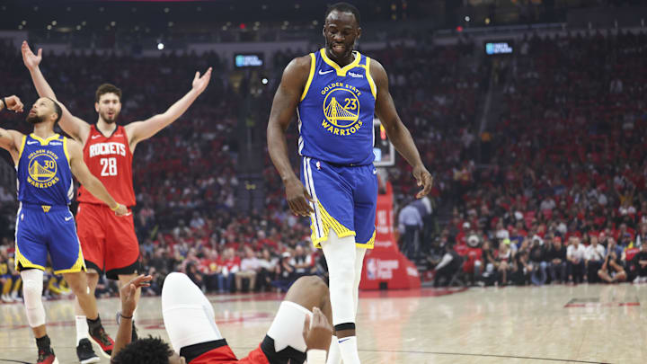 Apr 23, 2025; Houston, Texas, USA; Golden State Warriors forward Draymond Green (23) stands over Houston Rockets forward Amen Thompson (1) after a play during the first quarter during game two of the first round for the 2024 NBA Playoffs at Toyota Center. Mandatory Credit: Troy Taormina-Imagn Images Apr 23, 2025; Houston, Texas, USA; Golden State Warriors forward Draymond Green (23) stands over Houston Rockets forward Amen Thompson (1) after a play during the first quarter during game two of the first round for the 2024 NBA Playoffs at Toyota Center. Mandatory Credit: Troy Taormina-Imagn Images