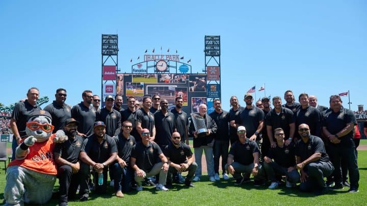 Aug 10, 2024; San Francisco, California, USA; Members of the 2014 San Francisco Giants World Series Team pose for a group photo before the game between the Detroit Tigers and the San Francisco Giants at Oracle Park. 