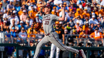Jun 24, 2024; Omaha, NE, USA; Texas A&M Aggies starting pitcher Justin Lamkin (33) pitches against the Tennessee Volunteers during the first inning at Charles Schwab Field Omaha. Mandatory Credit: Dylan Widger-USA TODAY Sports