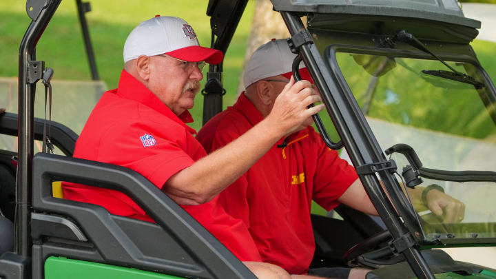 Jul 26, 2024; Kansas City, MO, USA; Kansas City Chiefs head coach Andy Reid rides a golf cart from the locker room to the fields prior to training camp at Missouri Western State University. Mandatory Credit: Denny Medley-USA TODAY Sports