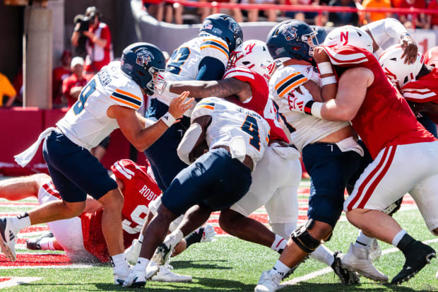 UTEP Miners running back Jevon Jackson (4) is tackled for a safety by the Nebraska Cornhuskers