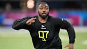 Feb 27, 2025; Indianapolis, IN, USA; Oregon defensive lineman Jamaree Caldwell (DL07) participates in drills during the 2025 NFL Combine at Lucas Oil Stadium. Mandatory Credit: Kirby Lee-Imagn Images