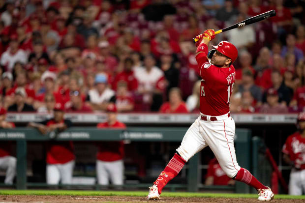 Joey Votto swings the bat in a home game with the Reds