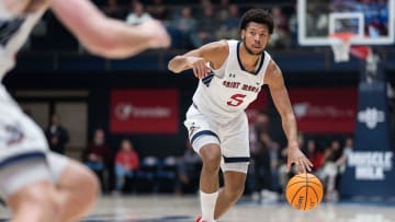 Nov 27, 2023; Moraga, California, USA;  St. Mary's Gaels forward Joshua Jefferson (5) controls the ball during the second half against the Utah Utes at University Credit Union Pavilion. Mandatory Credit: Stan Szeto-USA TODAY Sports