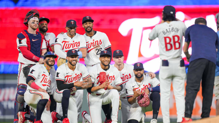 Jun 13, 2024; Minneapolis, Minnesota, USA; The Minnesota Twins celebrate after the game against the Oakland Athletics at Target Field. Mandatory Credit: Brad Rempel-USA TODAY Sports