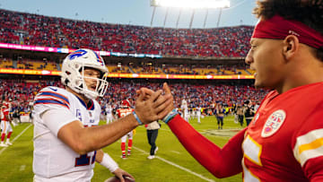 Buffalo Bills quarterback Josh Allen shakes hands with Kansas City Chiefs quarterback Patrick Mahomes.