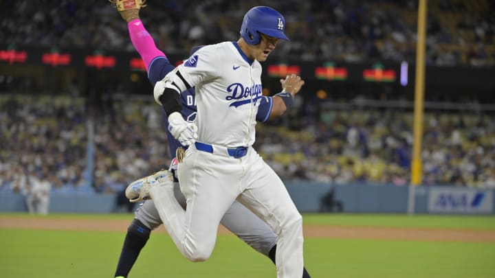 Los Angeles Dodgers designated hitter Shohei Ohtani (17) beats the throw to Tampa Bay Rays first baseman Yandy Diaz (2) for a single in the fourth inning at Dodger Stadium on Aug 23.