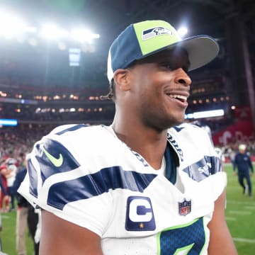 Jan 7, 2024; Glendale, Arizona, USA; Seattle Seahawks quarterback Geno Smith (7) reacts after the game against the Arizona Cardinals at State Farm Stadium.