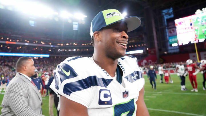 Jan 7, 2024; Glendale, Arizona, USA; Seattle Seahawks quarterback Geno Smith (7) reacts after the game against the Arizona Cardinals at State Farm Stadium.