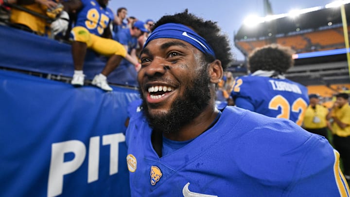 Sep 14, 2024; Pittsburgh, Pennsylvania, USA; Pittsburgh Panthers running back Desmond Reid celebrates after defeating the West Virginia Mountaineers at Acrisure Stadium. Mandatory Credit: Barry Reeger-Image Images Sep 14, 2024; Pittsburgh, Pennsylvania, USA; Pittsburgh Panthers running back Desmond Reid celebrates after defeating the West Virginia Mountaineers at Acrisure Stadium. Mandatory Credit: Barry Reeger-Image Images