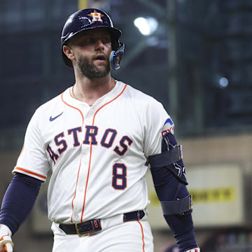 Jul 29, 2025; Houston, Texas, USA; Houston Astros first baseman Christian Walker (8) reacts after a play during the third inning against the Washington Nationals at Daikin Park. Mandatory Credit: Troy Taormina-Imagn Images