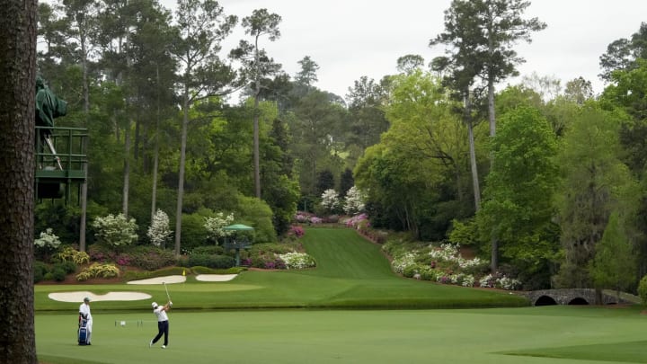 Apr 9, 2024; Augusta, Georgia, USA; Jose Maria Olazabal plays his second shot on no. 13 during a